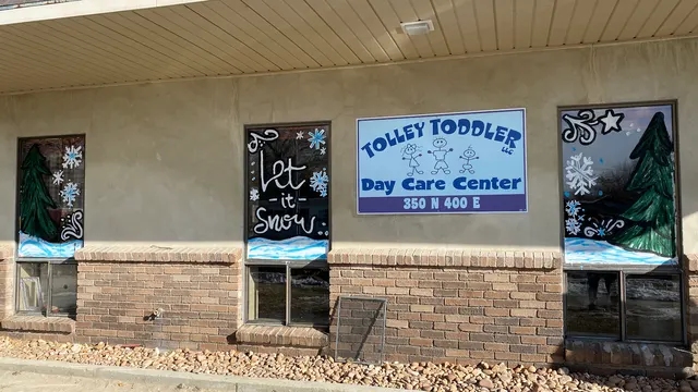 The Tolley Toddlers Day Care Center front windows and sign
